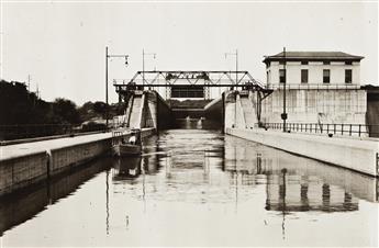 (SHIPPING--CANALS) An album with more than 50 photographs documenting the New York State canal system.